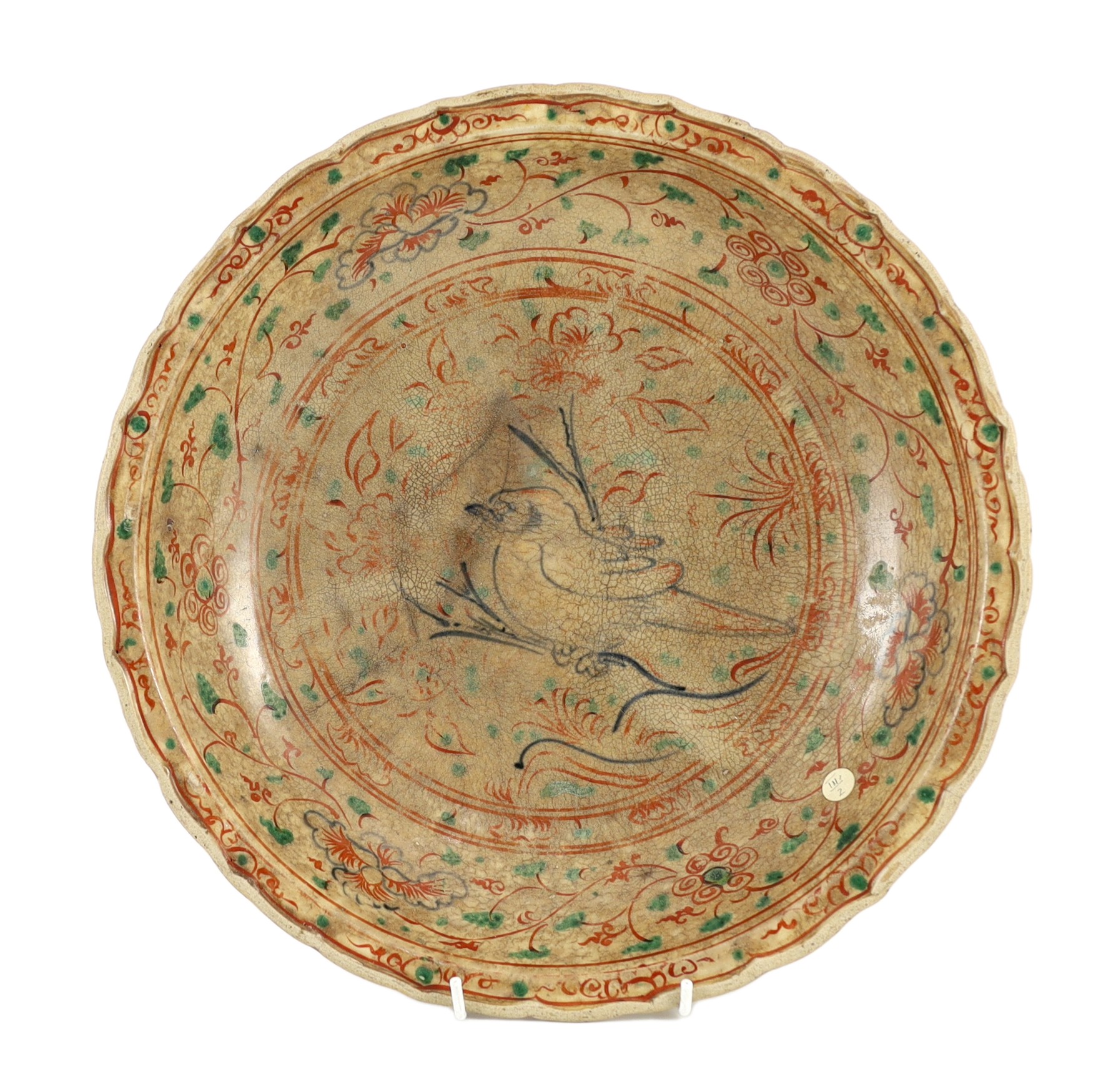 An Annamese polychrome ‘bird’ dish, 15th-16th century, 34.5cm diameter, stained and with cracks